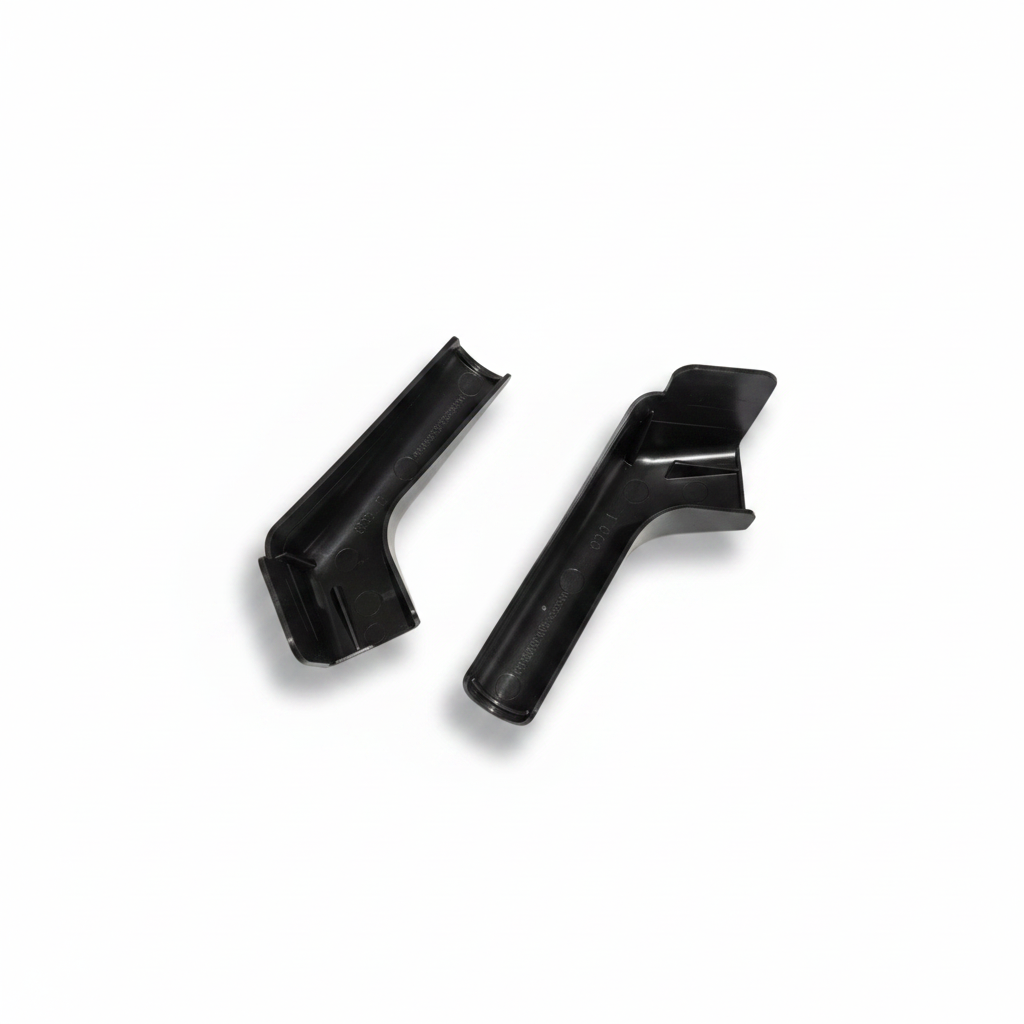 Two black spouts on white background with shadow